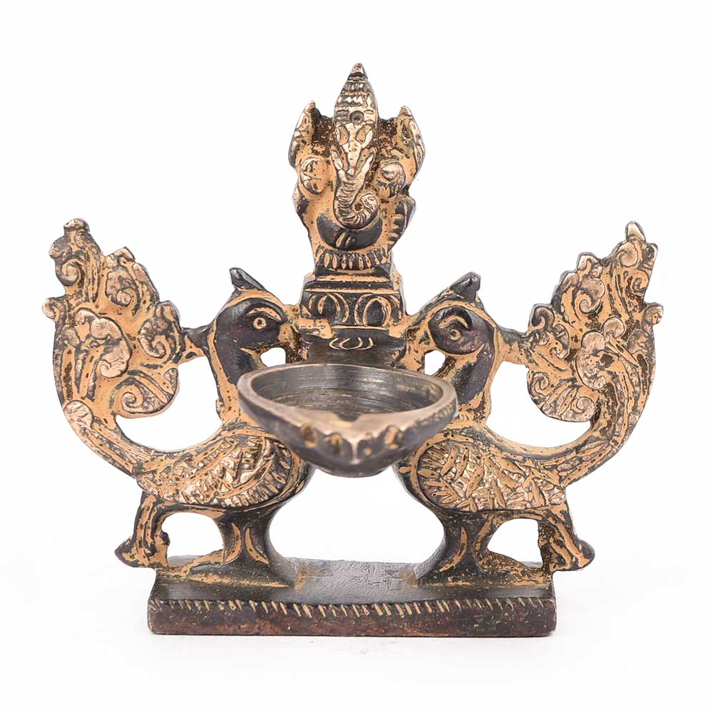 Brass Lamp of Two Peacock Holding Lord Ganesh At Centre