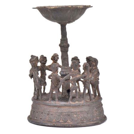 Brass Tribal Folk Dance around A Tall Candleholder
