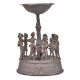 Brass Tribal Folk Dance around A Tall Candleholder