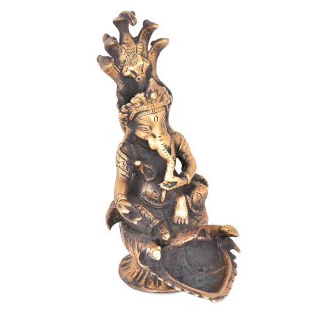Brass Ganesha Sitting With Sheshnag And Diya