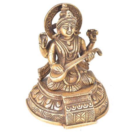 Brass Goddess Sarswati Sitting On A Raised Platform