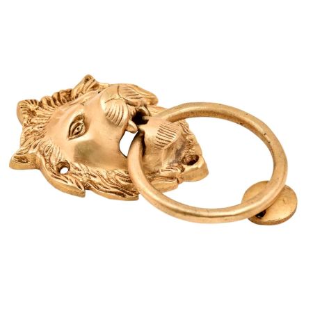 Brass Lion Head Door Knocker With A large Brass Ring Gripped In Its Mouth