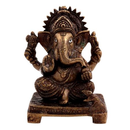Brass Ganesha Statue Sitting On A Chowki