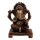 Brass Ganesha Statue Sitting On A Chowki