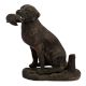 Brass Sitting Dog Statue Holding Flesh Of A Animal