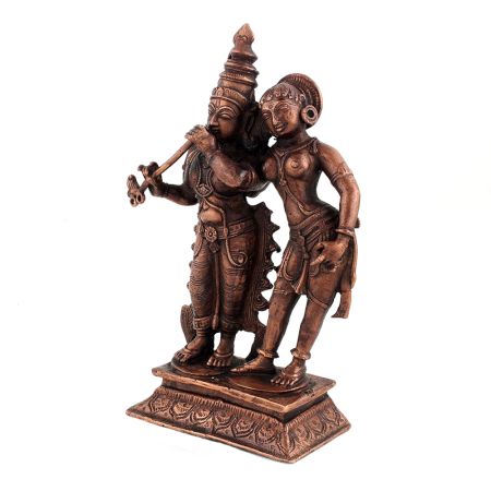 Statue Of Lord Krishna Playing Flute Alongside Goddess Radha