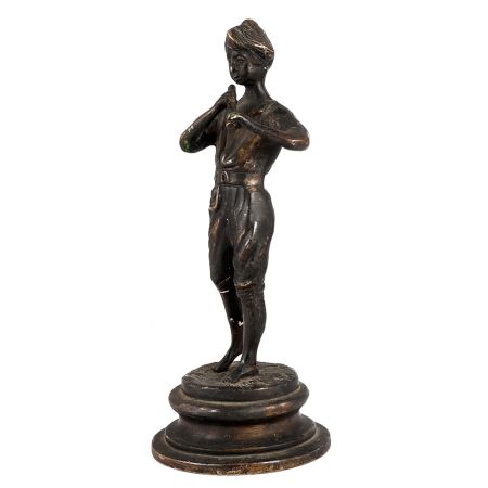 Brass Statue Of Boy Playing Flute