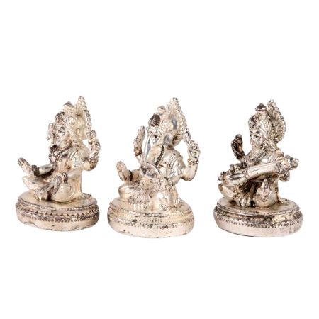 Copper Idols Of Goddess Saraswati Lakshmi and Lord Ganesh In Silver Finish