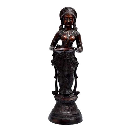 Brass Deep Laxmi Holding Oil Lamp In Antique Finish