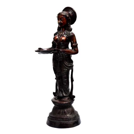 Brass Deep Laxmi Holding Oil Lamp In Antique Finish