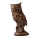 Brass Owl  Statue Perched On Top Of A Wooden Branch