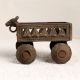 Vintage Brass Cart with Four Wheels in Tribal Art