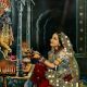 Vintage Paper Print of Lord Krishna Worshipped by Meera