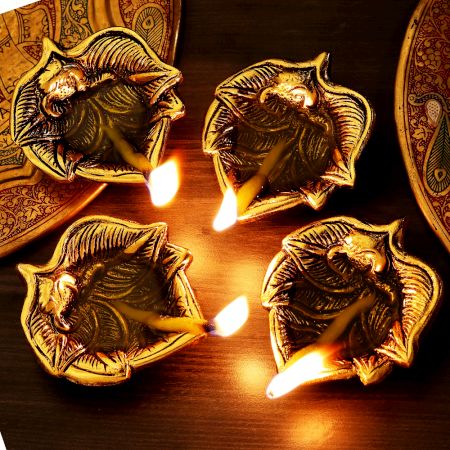 Handmade Golden Aluminium Ganpati on Leaf Shape Diwali Diya