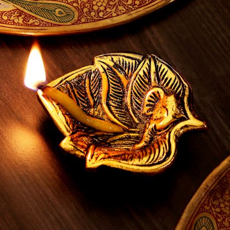 Handmade Golden Aluminium Ganpati on Leaf Shape Diwali Diya