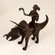 Dark Finish Handmade Brass Triceratops with Rider in Tribal Art