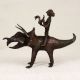 Dark Finish Handmade Brass Triceratops with Rider in Tribal Art