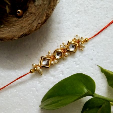 Traditional Rakhi with Wooden, Kundan Beads, Acrylic, Metal