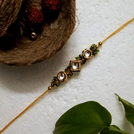 Traditional Rakhi with Acrylic, Metal, Wooden, Kundan Beads