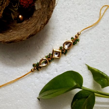 Traditional Rakhi with Metal, Acrylic, Kundan Beads, Wooden