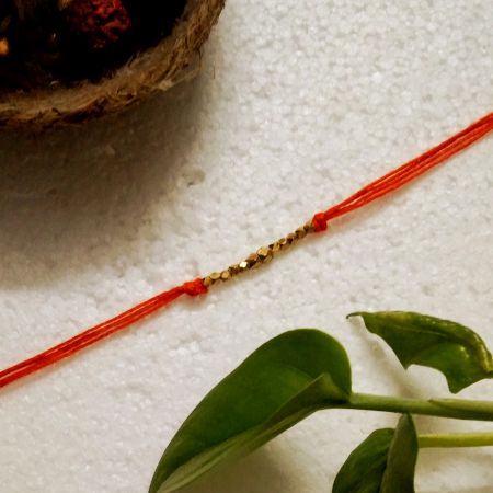 Traditional Rakhi with Brass Beads