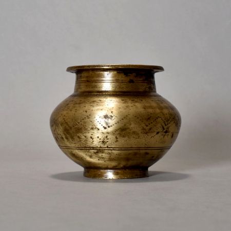 A Holy Water Pot With Dotted Design Made Of Pure Brass