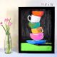 Balance Still Life with Stacked Cups in Oil Pastels on Paper by Artist Dimpana | 11.5 x 15 Inches