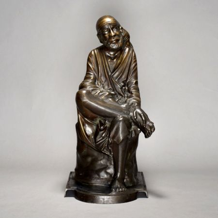 Sitting Figure Of Sai Ram In Brass Material