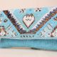 Boho Spirit Hand-Beaded Clutch with Tribal Motifs and Chain Strap