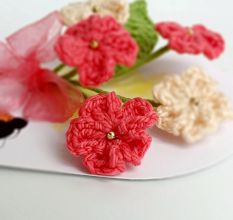 Layered Pink Crochet Flower With Delicate Leaves