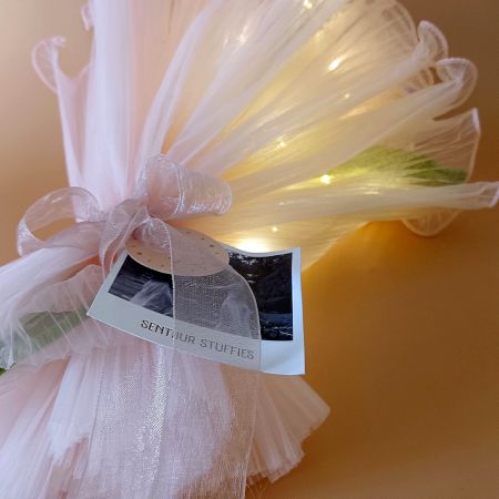 Wine Red Crochet Sunflower Wrapped In Peach Tulle