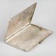 Vintage Engraved Silver Cigarette Case with Animal Motifs